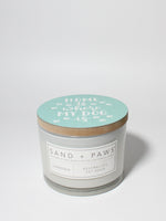 Sand + Paws Gardenia 12 oz scented candle White Vessel with Painted Home is Where my Dog Is lid